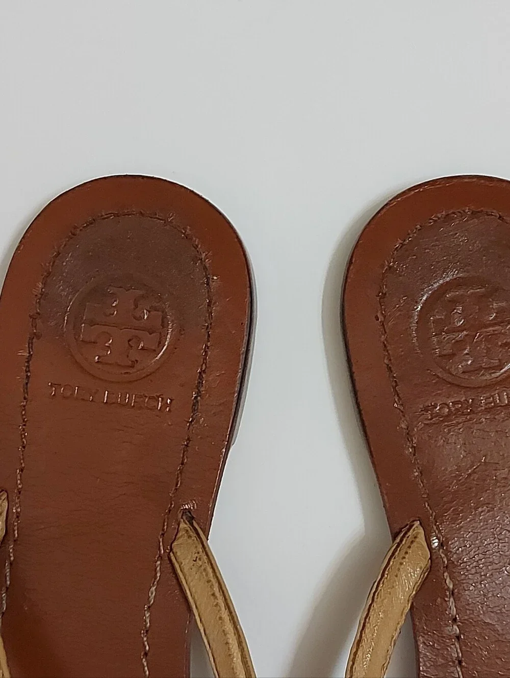 Tory Burch Brown Leather Flip Flop Sandals with Tan Straps and Gold Medallion